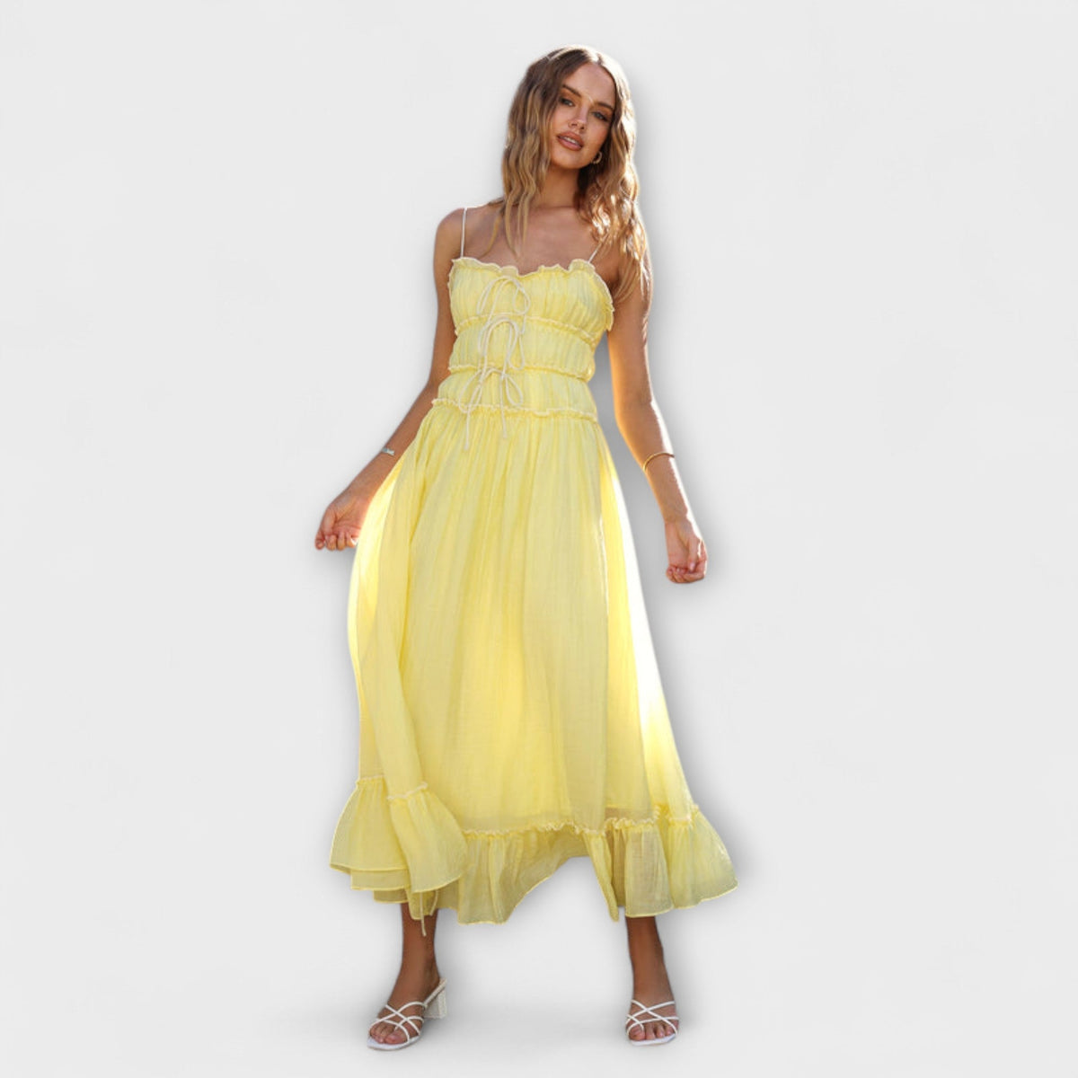 ROMINA | Vestido midi sin mangas con volantes