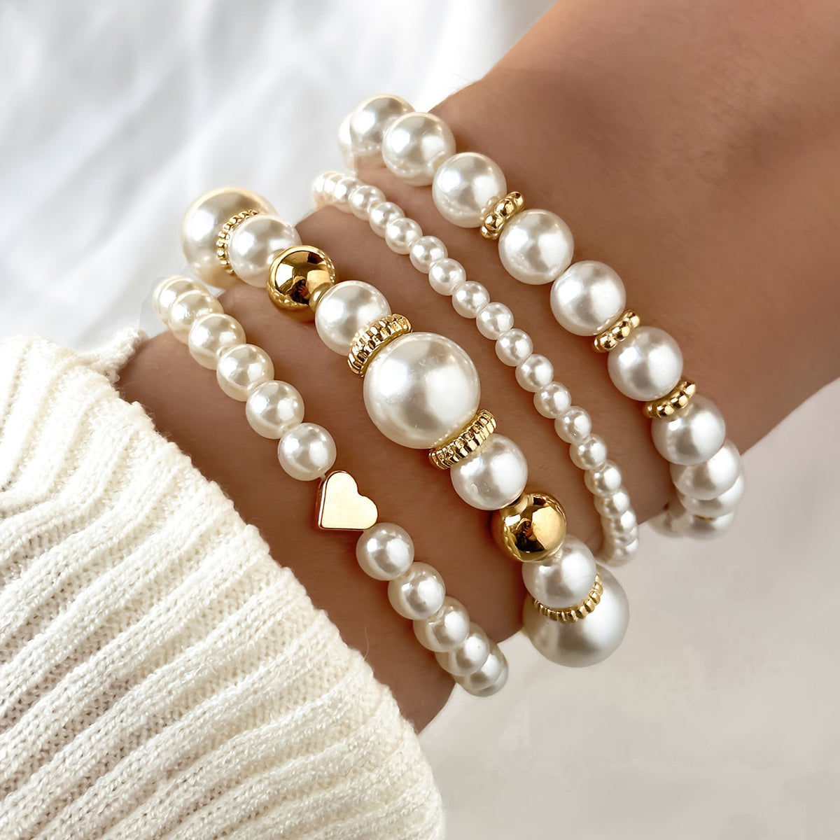 MARÍA JOSÉ JOSÉ | Pulseras de corazón con perlas