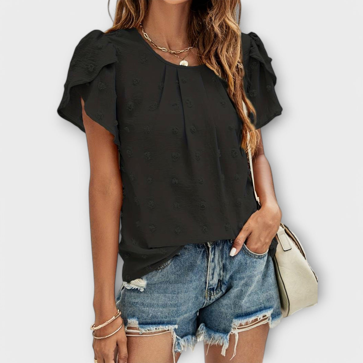 ROSA | Blusa con textura de lunares