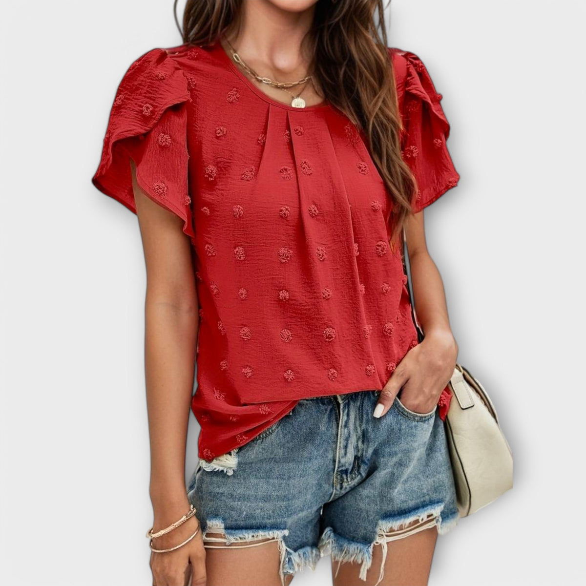 ROSA | Blusa con textura de lunares