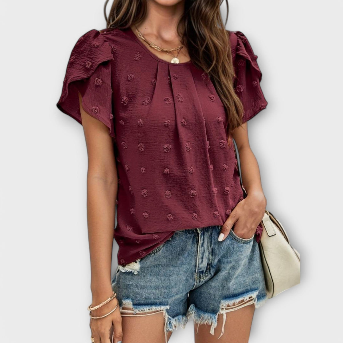 ROSA | Blusa con textura de lunares