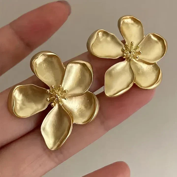 MARÍA JOSÉ JOSÉ | Pendientes de flores doradas