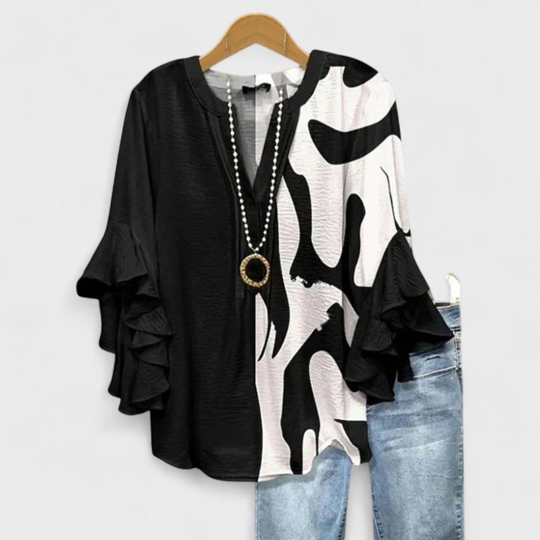 EMILIA | Blusa con volantes florales