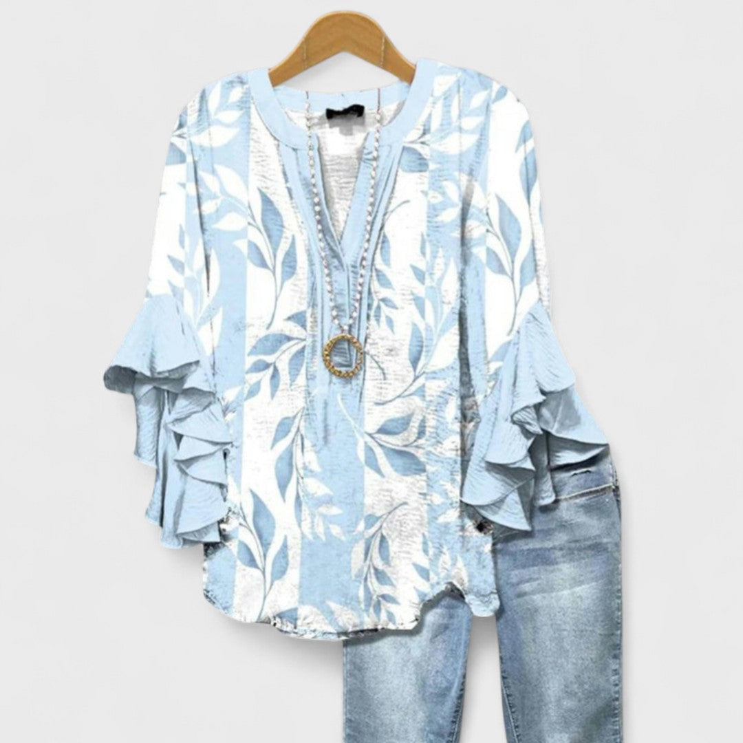 EMILIA | Blusa con volantes florales