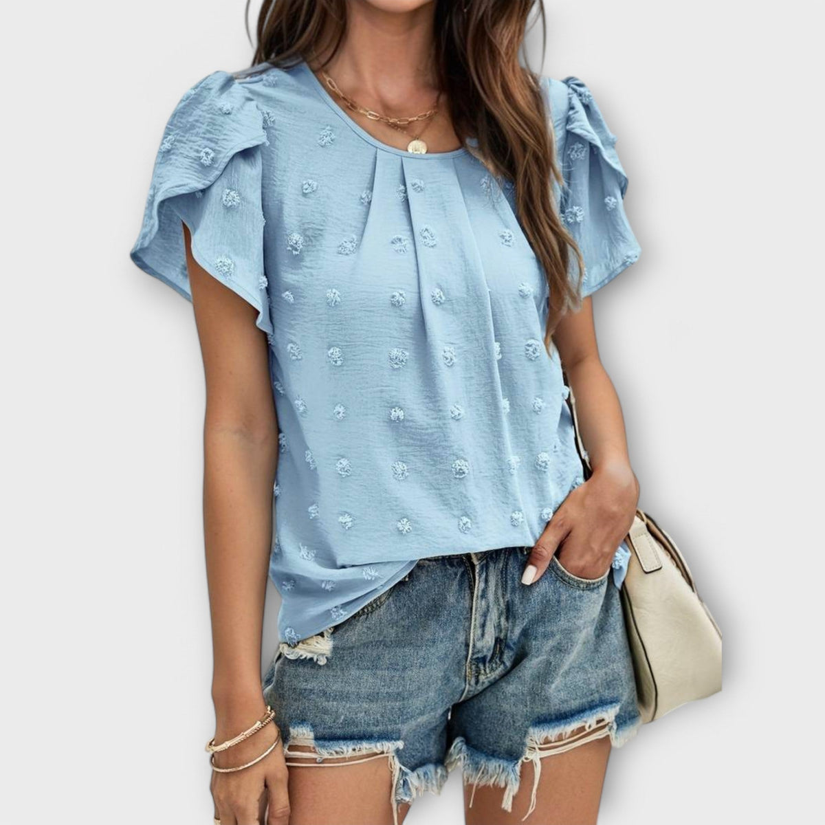 ROSA | Blusa con textura de lunares